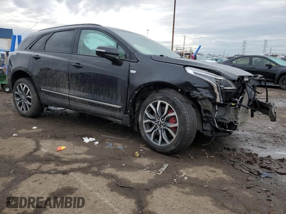 2023 Cadillac XT5 AWD Sport with VIN 1GYKNHRS4PZ232257, listed as a Copart auction lot 45865565 with 26,522 mi miles and Non repairable. Bid and sale history available at DreamBid. Image 4.