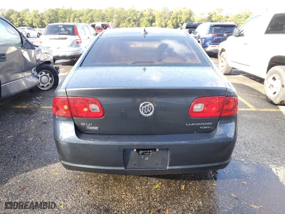 2009 Buick Lucerne CXL with VIN 1G4HD57MX9U115526, listed as a Copart auction lot 58079694 with 128,028 mi miles and Salvage Title. Bid and sale history available at carsss.com. Image 6.