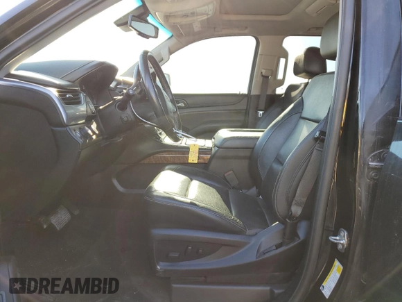 2019 Chevrolet Suburban Premier with VIN 1GNSKJKC7KR146871, listed as a Copart auction lot 43017234 with 96,965 mi miles and Salvage Title. Bid and sale history available at DreamBid. Image 7.