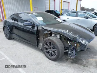2023 Tesla Model S с VIN 5YJSA1E52PF528795, выставлен на аукционе IAAI как лот 42110660 с пробегом 21 243 миль миль и . История ставок и продаж доступна на DreamBid. Изображение 1.