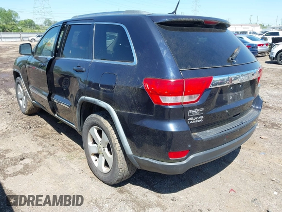 2011 Jeep Grand Cherokee Laredo with VIN 1J4RR4GG8BC525701, listed as a IAAI auction lot 42240431 with 198,921 mi miles and . Bid and sale history available at DreamBid. Image 3.