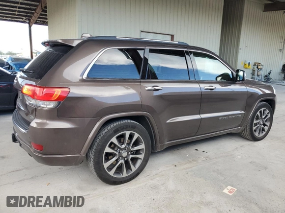 2017 Jeep Grand Cherokee Overland with VIN 1C4RJFCTXHC768687, listed as a Copart auction lot 51442495 with 123,578 mi miles and Clean Title. Bid and sale history available at carsss.com. Image 3.