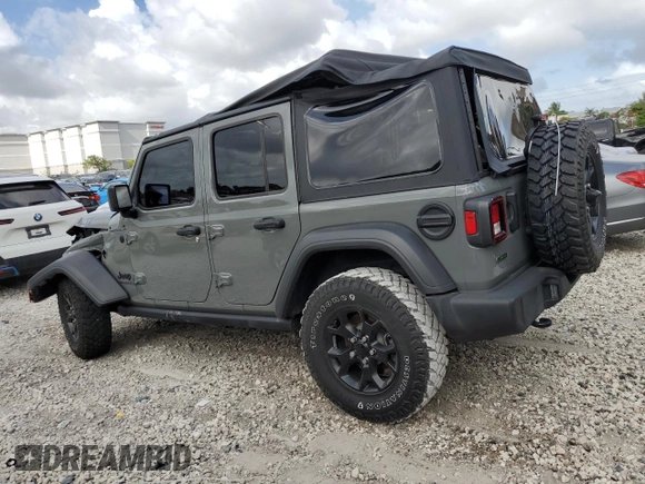 2021 Jeep Wrangler Unlimited Willys with VIN 1C4HJXDM6MW628041, listed as a Copart auction lot 51366415 with 22,697 mi miles and Salvage title. Bid and sale history available at DreamBid. Image 2.