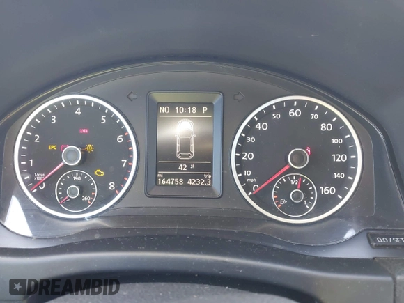 2013 Volkswagen Tiguan SE with VIN WVGBV7AX7DW511699, listed as a IAAI auction lot 41970908 with 164,758 mi miles and . Bid and sale history available at DreamBid. Image 7.