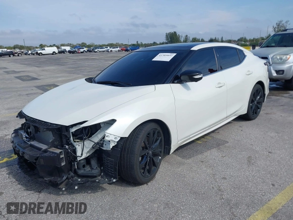 2023 Nissan Maxima SR with VIN 1N4AA6EV2PC505917, listed as a IAAI auction lot 41389852 with 26,018 mi miles and . Bid and sale history available at DreamBid. Image 2.