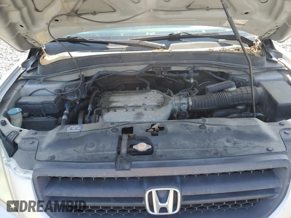 2005 Honda Pilot EX-L with VIN 2HKYF18505H500452, listed as a Copart auction lot 57552535 with 282,733 mi miles and Salvage title. Bid and sale history available at DreamBid. Image 12.