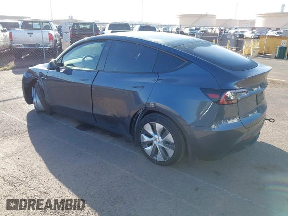 2023 Tesla Model Y Long Range with VIN 7SAYGDEE0PF928836, listed as a IAAI auction lot 41538742 with 9,630 mi miles and . Bid and sale history available at DreamBid. Image 3.