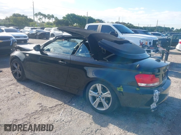 2011 BMW 1 Series 128i with VIN WBAUL7C54BVM80474, listed as a IAAI auction lot 42031032 with 76,617 mi miles and . Bid and sale history available at carsss.com. Image 3.