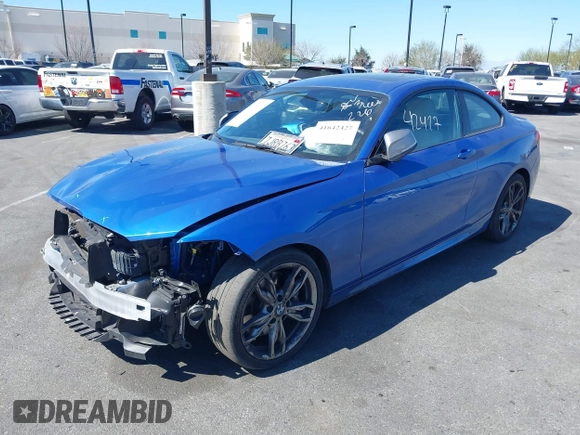 2015 BMW 2 Series M235i with VIN WBA1J7C59FV254140, listed as a IAAI auction lot 41642427 with 23,957 mi miles and . Bid and sale history available at carsss.com. Image 2.