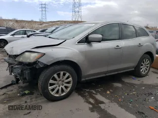 2010 Mazda CX-7 SV with VIN JM3ER2W57A0321844, listed as a Copart auction lot 89023205 with 204,529 mi miles and Salvage Title. Bid and sale history available at carsss.com. Image 1.