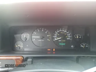 1998 Jeep Grand Cherokee Laredo with VIN 1J4FX58S3WC144684, listed as a Copart auction lot 67226694 with 106,602 mi miles and Clean Title. Bid and sale history available at carsss.com. Image 9.