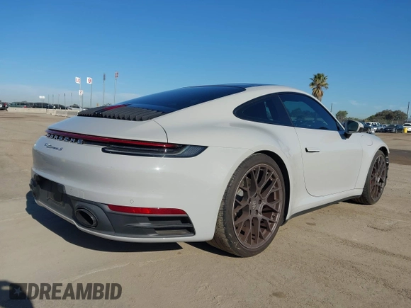 2020 Porsche 911 Carrera S with VIN WP0AB2A90LS226443, listed as a IAAI auction lot 42019338 with 19,734 mi miles and . Bid and sale history available at DreamBid. Image 4.