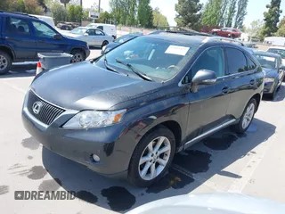 2010 Lexus RX 350 with VIN 2T2BK1BA8AC061209, listed as a IAAI auction lot 42105424 with 242,961 mi miles. Bid and sale history available at carsss.com. Image 2.