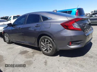 2018 Honda Civic EX с VIN 19XFC2F79JE040927, выставлен на аукционе Copart как лот 55696165 с пробегом 58 696 миль миль и Списание • Salvage title. История ставок и продаж доступна на DreamBid. Изображение 2.