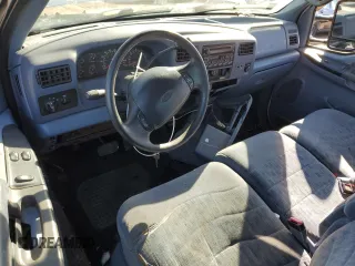 1999 Ford F-250 XL with VIN 1FTNX21L0XEB46210, listed as a Copart auction lot 45749725 with 221,529 mi miles and Salvage title. Bid and sale history available at DreamBid. Image 8.