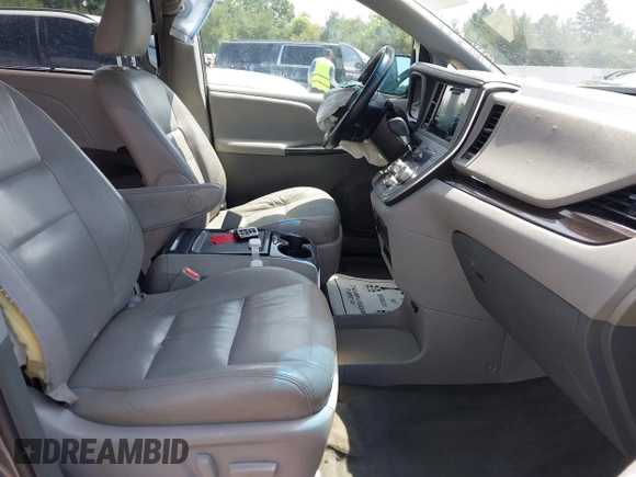 2015 Toyota Sienna XLE with VIN 5TDYK3DCXFS633128, listed as a IAAI auction lot 42527073 with 149,926 mi miles and . Bid and sale history available at DreamBid. Image 5.