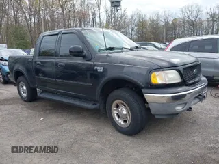 2001 Ford F-150 SuperCrew XLT with VIN 1FTRW08L61KF76055, listed as a IAAI auction lot 42027968 with 301,095 mi miles. Bid and sale history available at carsss.com. Image 1.