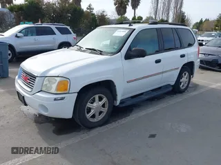 2008 GMC Envoy SLE1 with VIN 1GKDS13S482171739, listed as a IAAI auction lot 41613890 with 233,268 mi miles and . Bid and sale history available at DreamBid. Image 2.
