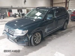2018 Volkswagen Tiguan SEL with VIN 3VV2B7AX3JM133326, listed as a IAAI auction lot 42459190 with 94,665 mi miles and . Bid and sale history available at DreamBid. Image 17.