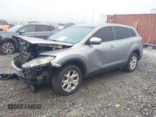 2013 Mazda CX-9 Sport with VIN JM3TB2BA5D0413747, listed as a IAAI auction lot 41107056 with 169,914 mi miles and . Bid and sale history available at carsss.com. Image 2.