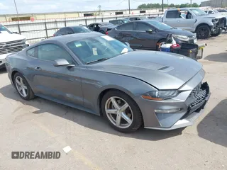 2022 Ford Mustang EcoBoost with VIN 1FA6P8TH2N5104155, listed as a IAAI auction lot 42068259 with 47,963 mi miles and . Bid and sale history available at DreamBid. Image 1.