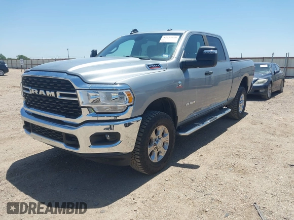2023 Ram 2500 Big Horn z VIN 3C6UR5DL1PG654074, wystawiony jako IAAI lot #42255020 z przebiegiem 67 732 mil mil oraz . Historia ofert i sprzedaży dostępna na DreamBid. Obrazek 17.