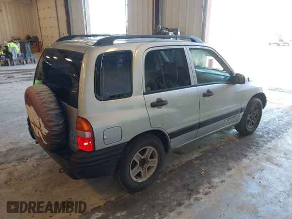 2003 Chevrolet Tracker z VIN 2CNBE13C336953203, wystawiony jako IAAI lot #42195810 z przebiegiem 123 503 mil mil oraz . Historia ofert i sprzedaży dostępna na DreamBid. Obrazek 4.