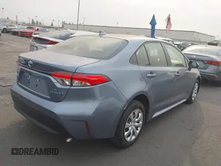2023 Toyota Corolla Hybrid LE with VIN JTDBCMFE0P3023071, listed as a IAAI auction lot 41273943 with 26,250 mi miles. Bid and sale history available at carsss.com. Image 4.