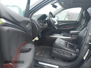 2016 Acura MDX with VIN 5FRYD3H23GB007677, listed as a IAAI auction lot 41586346 with 104,586 mi miles. Bid and sale history available at carsss.com. Image 5.