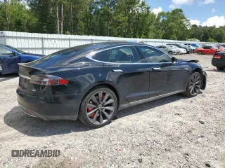 2013 Tesla Model S Performance с VIN 5YJSA1CP8DFP20786, выставлен на аукционе Copart как лот 61035395 с пробегом 140 119 миль миль и Списание • Salvage title. История ставок и продаж доступна на DreamBid. Изображение 3.