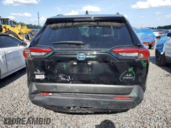 2023 Toyota RAV4 Hybrid LE with VIN JTMLWRFV7PD204946, listed as a Copart auction lot 51330055 with 10,560 mi miles and Salvage Title. Bid and sale history available at carsss.com. Image 6.