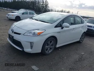2015 Toyota Prius Four with VIN JTDKN3DU9F0419871, listed as a IAAI auction lot 41598677 with 122,978 mi miles. Bid and sale history available at carsss.com. Image 2.