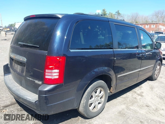 2010 Chrysler Town & Country Touring with VIN 2A4RR5DX1AR267330, listed as a IAAI auction lot 42041615 with 179,171 mi miles. Bid and sale history available at carsss.com. Image 4.