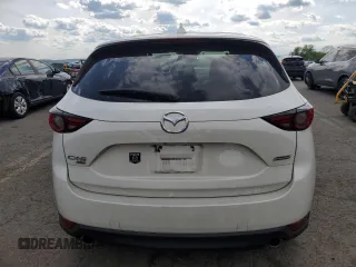 2018 Mazda CX-5 Grand Touring z VIN JM3KFBDM6J0447165, wystawiony jako Copart lot #56133015 z przebiegiem 80 579 mil mil oraz Szkoda całkowita • Salvage title. Historia ofert i sprzedaży dostępna na DreamBid. Obrazek 6.