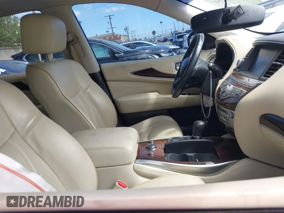 2015 Infiniti QX60 with VIN 5N1AL0MM3FC502870, listed as a IAAI auction lot 41734954 with 117,455 mi miles. Bid and sale history available at carsss.com. Image 5.