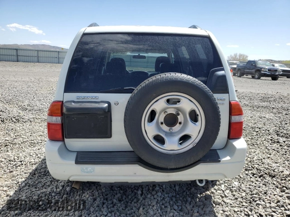 2003 Suzuki XL7 Touring with VIN JS3TX92V034109417, listed as a Copart auction lot 52672475 with 96,760 mi miles and Salvage title. Bid and sale history available at DreamBid. Image 6.