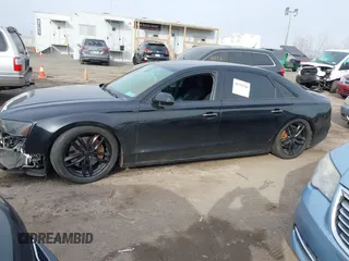 2016 Audi A8 L 4.0T Sport with VIN WAU43AFDXGN005323, listed as a IAAI auction lot 41311344 with 84,000 mi miles. Bid and sale history available at carsss.com. Image 14.