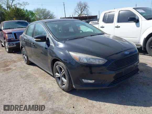 2016 Ford Focus SE with VIN 1FADP3FE7GL202284, listed as a IAAI auction lot 42014457 with 130,000 mi miles. Bid and sale history available at carsss.com. Image 1.