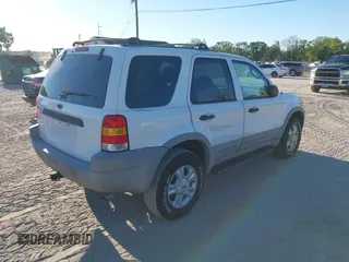 2002 Ford Escape XLT with VIN 1FMCU03112KC92704, listed as a IAAI auction lot 41807550 with 105,762 mi miles and . Bid and sale history available at DreamBid. Image 4.