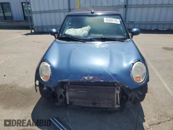 2011 MINI Convertible z VIN WMWZN3C56BTZ78387, wystawiony jako Copart lot #65002185 z przebiegiem 147 901 mil mil oraz Czysty tytuł • Clean title. Historia ofert i sprzedaży dostępna na DreamBid. Obrazek 5.