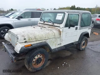 1990 Jeep Wrangler with VIN 2J4FY29T6LJ523487, listed as a IAAI auction lot 42008870 with 88,619 mi miles. Bid and sale history available at carsss.com. Image 2.