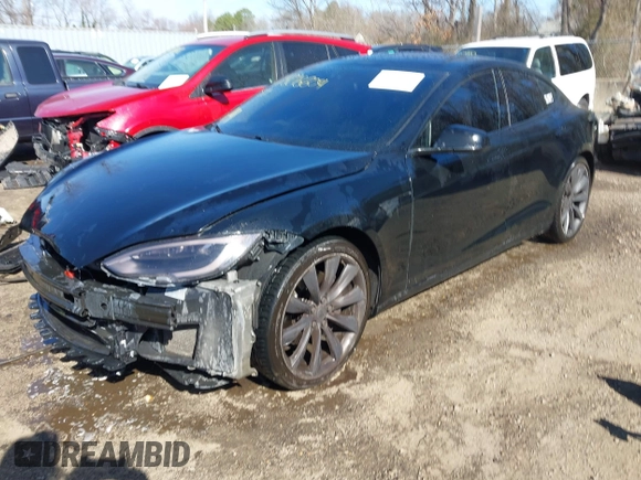 2014 Tesla Model S 60 with VIN 5YJSA1H1XEFP34226, listed as a IAAI auction lot 41806604 with 216,021 mi miles and . Bid and sale history available at DreamBid. Image 19.