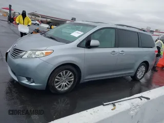 2011 Toyota Sienna XLE AAS with VIN 5TDYK3DC5BS111467, listed as a IAAI auction lot 41560895 with 126,917 mi miles. Bid and sale history available at carsss.com. Image 14.