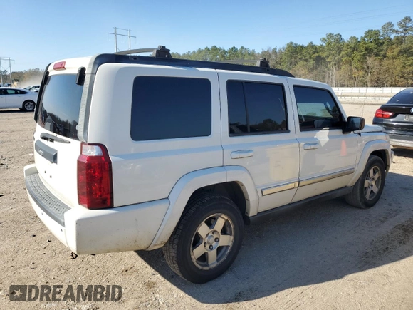2010 Jeep Commander Sport with VIN 1J4RH4GK9AC113888, listed as a Copart auction lot 84553544 with 208,109 mi miles and Salvage title. Bid and sale history available at DreamBid. Image 3.