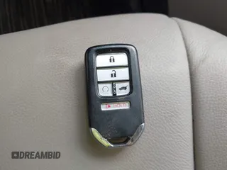 2016 Honda Pilot Touring with VIN 5FNYF6H90GB102403, listed as a IAAI auction lot 42007825 with 69,450 mi miles. Bid and sale history available at carsss.com. Image 11.