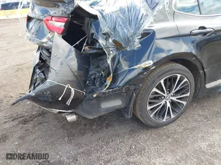 2018 Toyota Camry LE with VIN 4T1B11HK5JU076028, listed as a IAAI auction lot 41989266 with 215,235 mi miles. Bid and sale history available at carsss.com. Image 17.