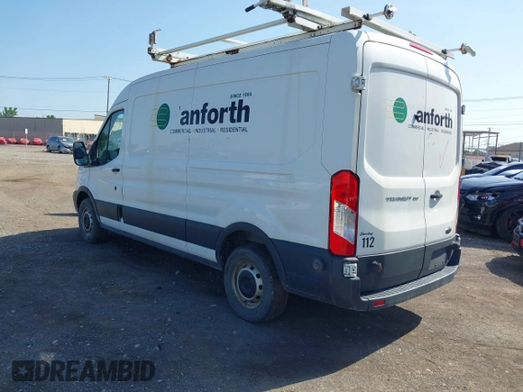 2015 Ford Transit Cargo with VIN 1FTNE2CM4FKA29323, listed as a IAAI auction lot 42406192 with 156,493 mi miles and . Bid and sale history available at DreamBid. Image 3.