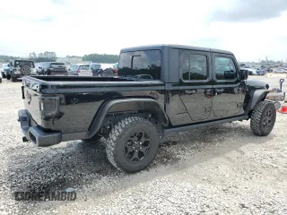2023 Jeep Gladiator Sport S with VIN 1C6HJTAG9PL525183, listed as a Copart auction lot 54556735 with 13,805 mi miles and Salvage title. Bid and sale history available at DreamBid. Image 3.