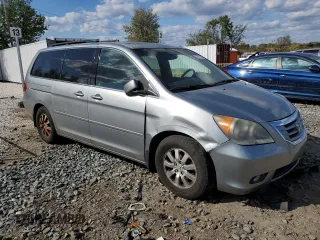 2010 Honda Odyssey EX-L with VIN 5FNRL3H78AB030903, listed as a Copart auction lot 52911705 with 200,499 mi miles and Salvage Title. Bid and sale history available at carsss.com. Image 4.