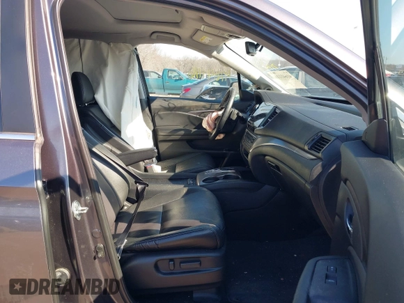 2021 Honda Pilot EX-L with VIN 5FNYF6H54MB028203, listed as a IAAI auction lot 41641116 with 46,755 mi miles and . Bid and sale history available at DreamBid. Image 5.